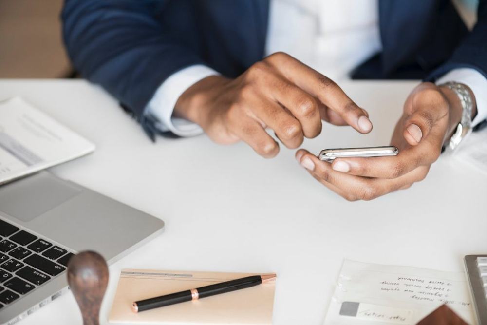 Businessman using a smartphone at his desk